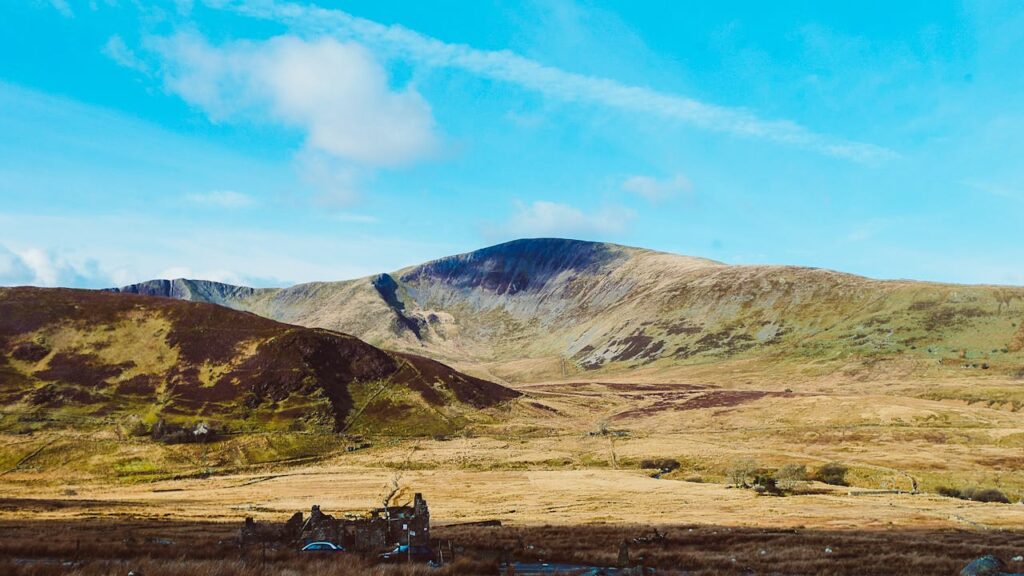 Breathtaking view of rolling hills in Snowdonia National Park, capturing nature's serene beauty.