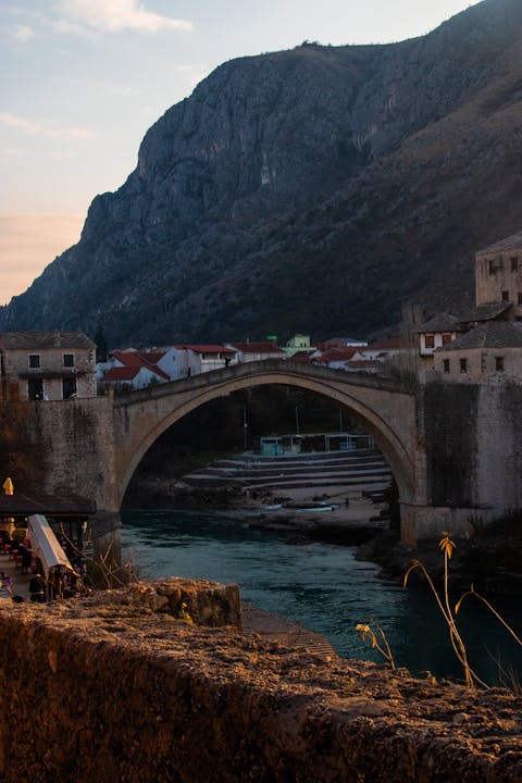 Breathtaking sunset view of the historic Old Bridge in Mostar, Bosnia and Herzegovina.